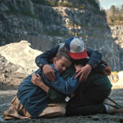 Stranger Things The Monster Eleven Mike Dustin hugging