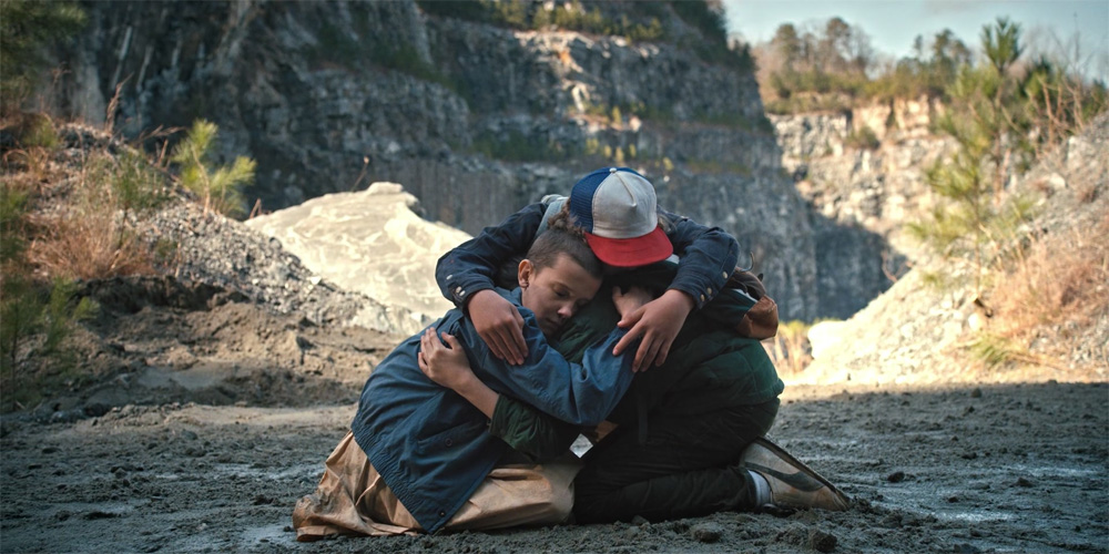 Stranger Things The Monster Eleven Mike Dustin hugging